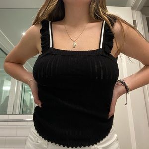 Black top with white stripes.